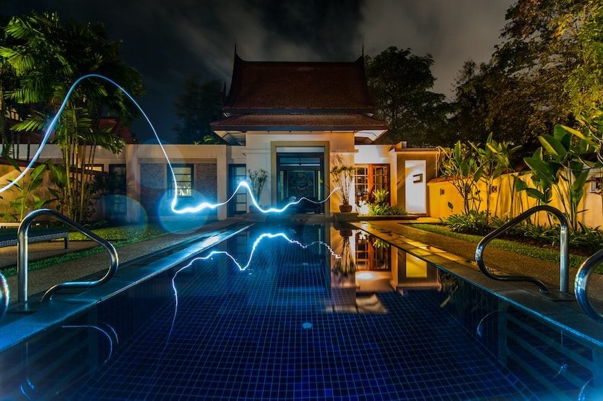 Reflection of Blue Light Crossing Above Pool