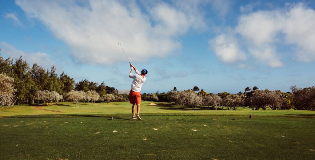 Man playing golf Photo by Nathan Nedley from Pexels