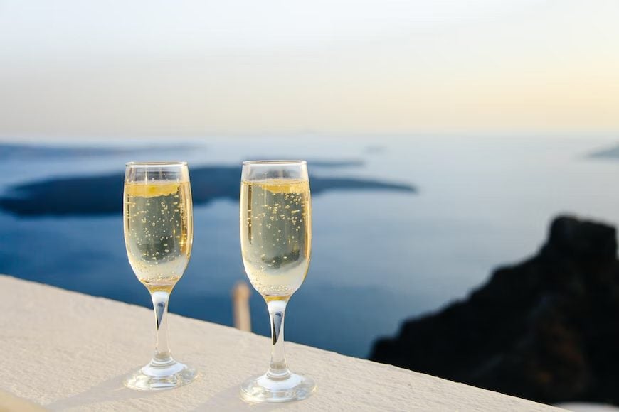 Sparkling wines at the beach Photo from Unsplash