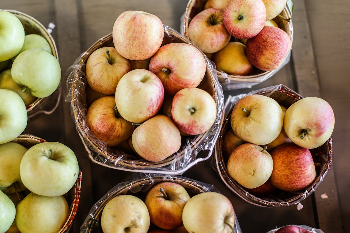 Photo of baskets full of apples