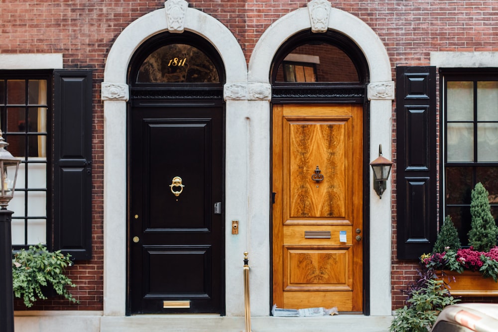 How much do different door materials cost