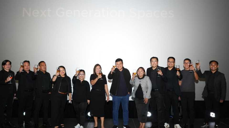 Group officers sharing a toast to the successful unveiling of new projects.